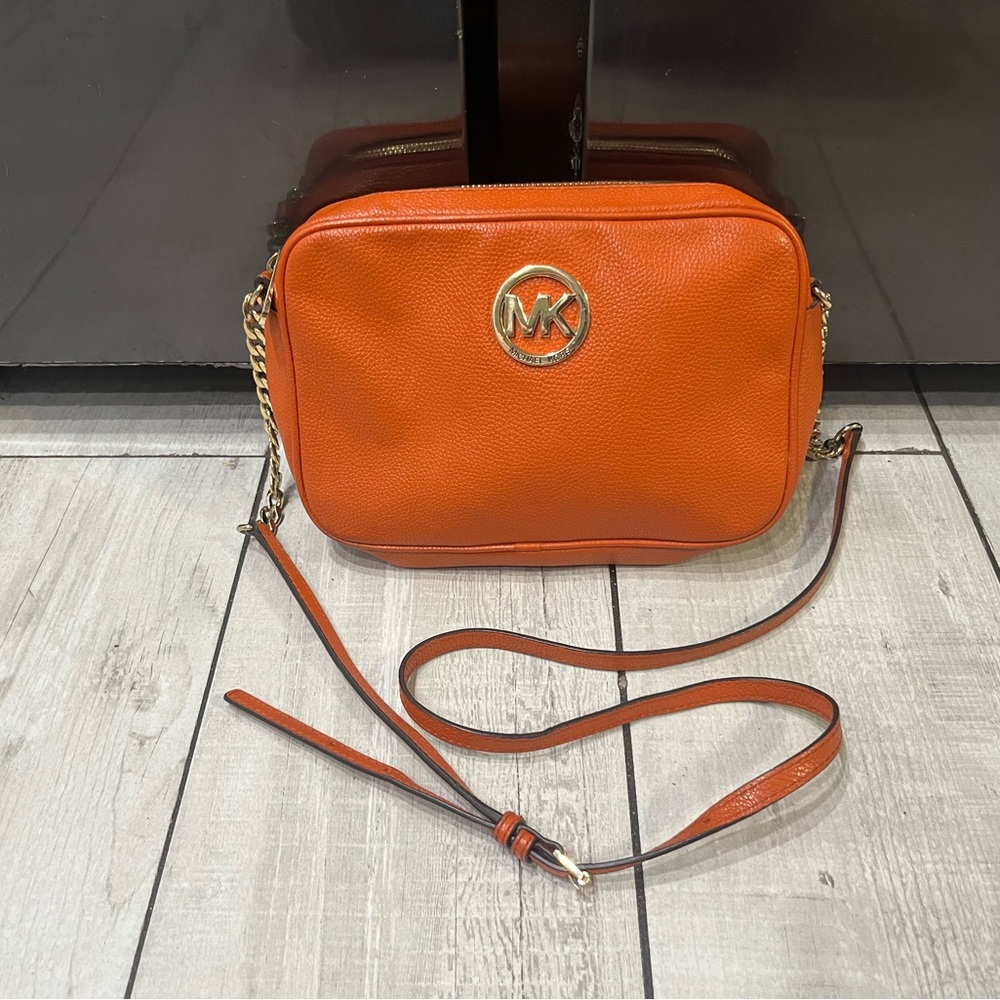 Michael Kors orange fulton large pebbled leather camera bag